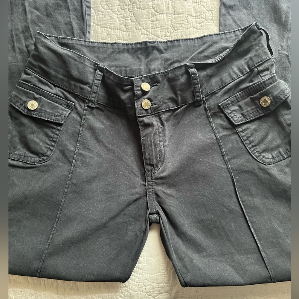flared black slacks